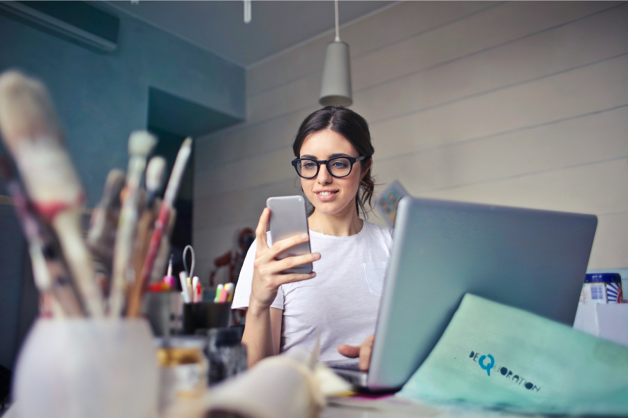 Woman in white shirt using smartphone - Photo by Bruce Mars on Unsplash