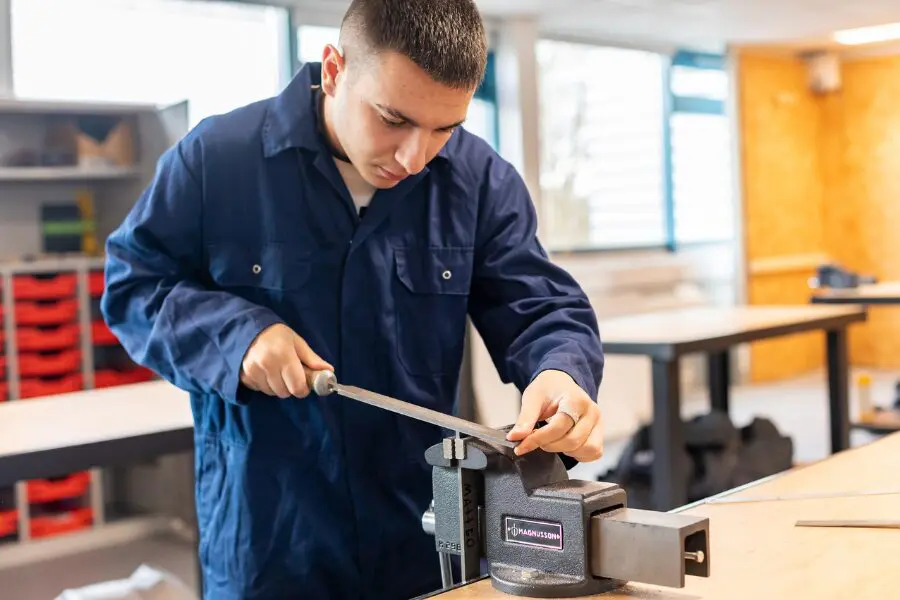 Capital City College student working in construction